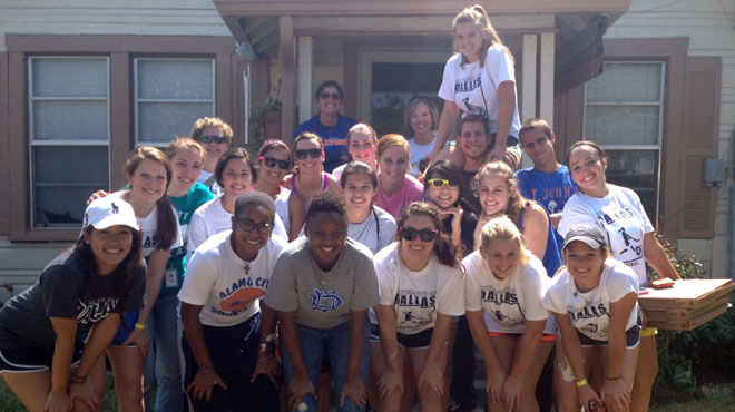 Dallas student-athletes serve community via Hearts and Hammers